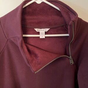 Women’s Athleta half zip.